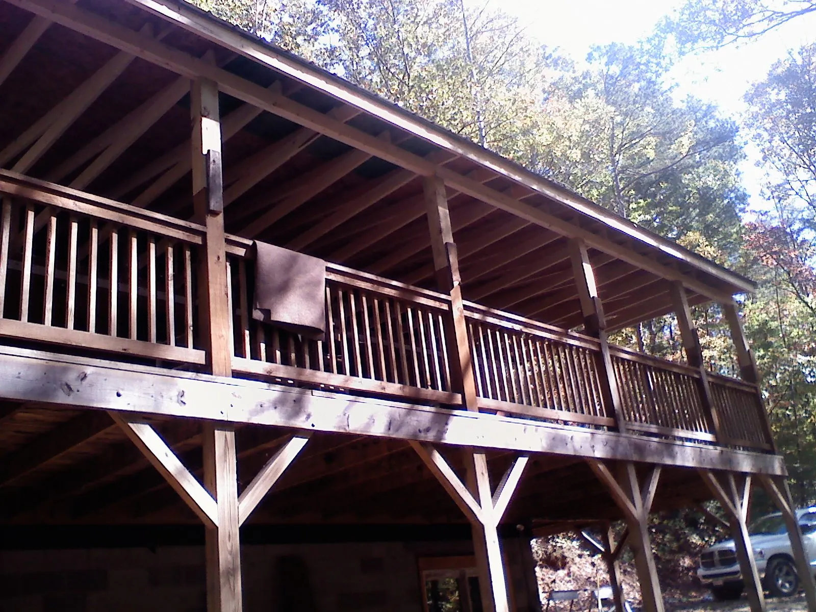 Timber framing under a new elevated porch and deck — Roof Leak Repair in Shelter Island by Roofing Brothers